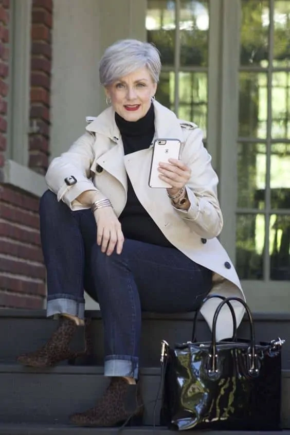Trench Coat Layered Over Turtleneck and Jeans Trench Coat Layered Over Turtleneck and Jeans β Winter Outfits for Women Over 50