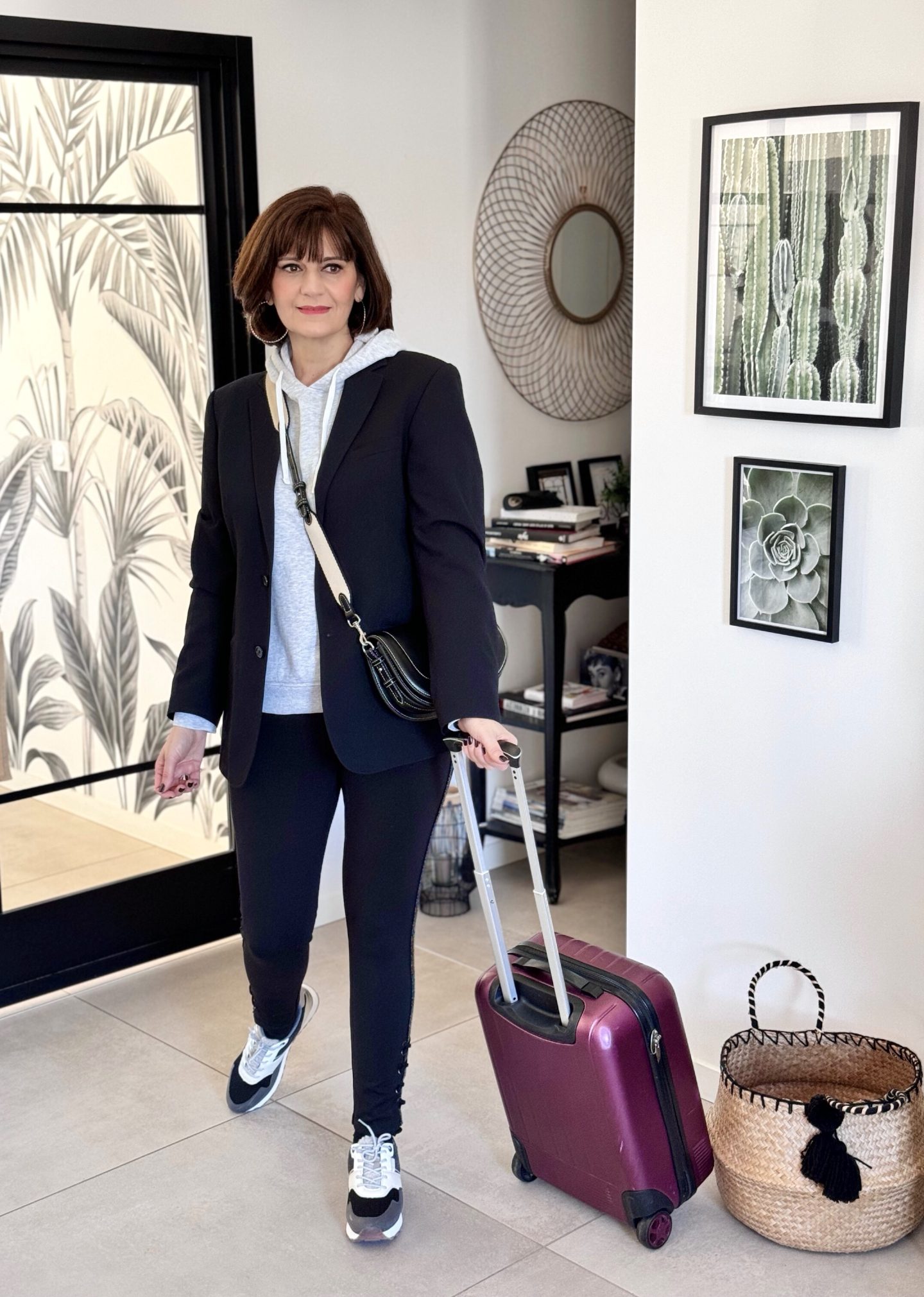 Polished Comfort: Blazer Over Hoodie and Slim Trousers Polished Comfort: Blazer Over Hoodie and Slim Trousers β Winter Airport Outfits
