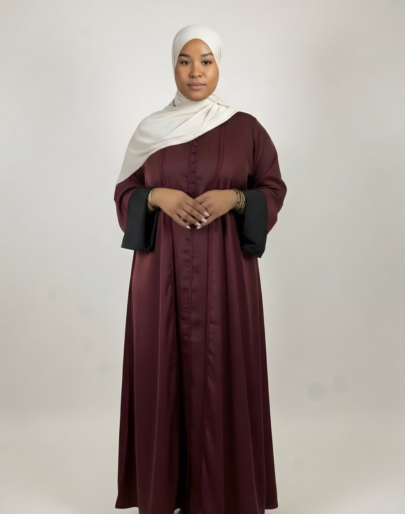 Burgundy Satin Abaya with Cream Hijab for Modest Elegance Burgundy Satin Abaya with Cream Hijab for Modest Elegance β Burgundy Outfits