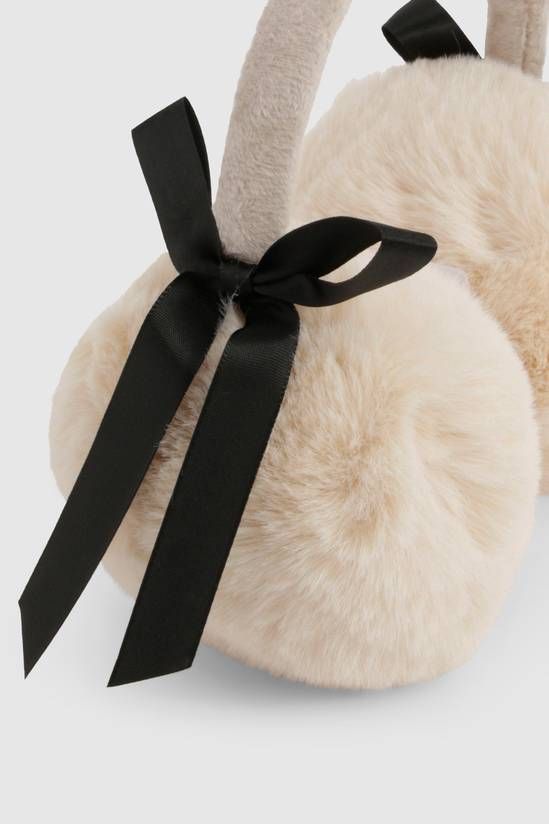 Cream Faux Fur Earmuffs with Elegant Black Bows — Earmuffs Outfits