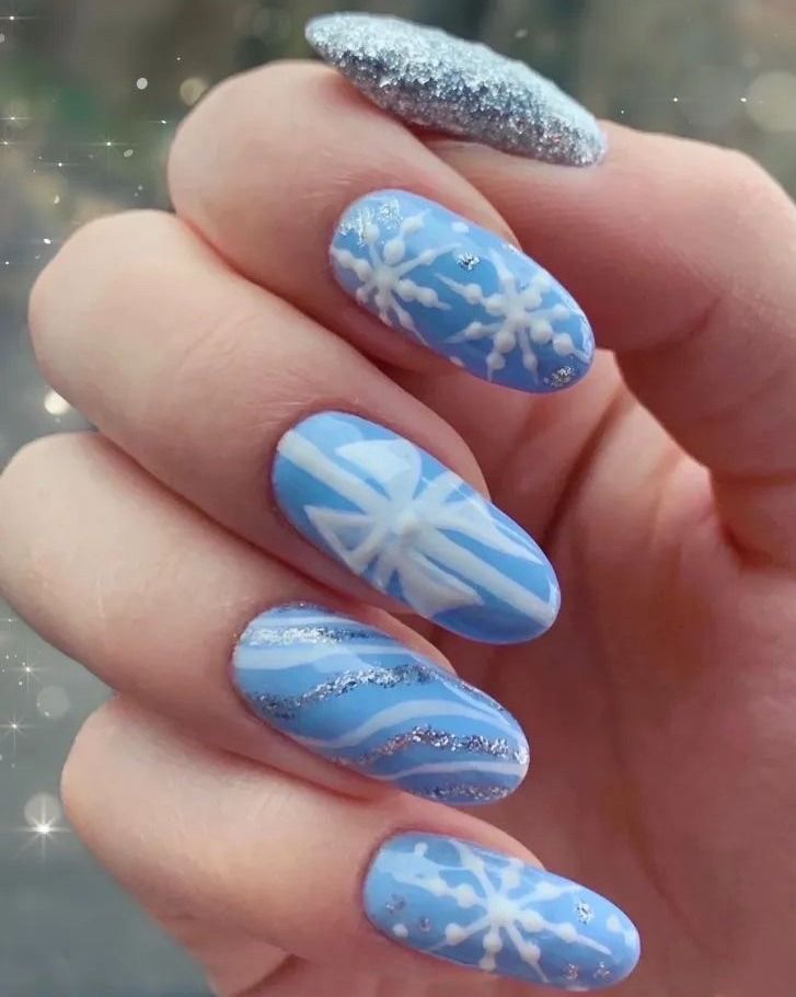 Intricate Snowflake and Swirl Art on Icy Blue Intricate Snowflake and Swirl Art on Icy Blue β Winter Nail Designs