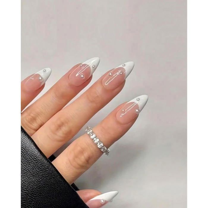 White French Tip Stilettos With Pearl Accents White French Tip Stilettos With Pearl Accents β Winter Stiletto Nails