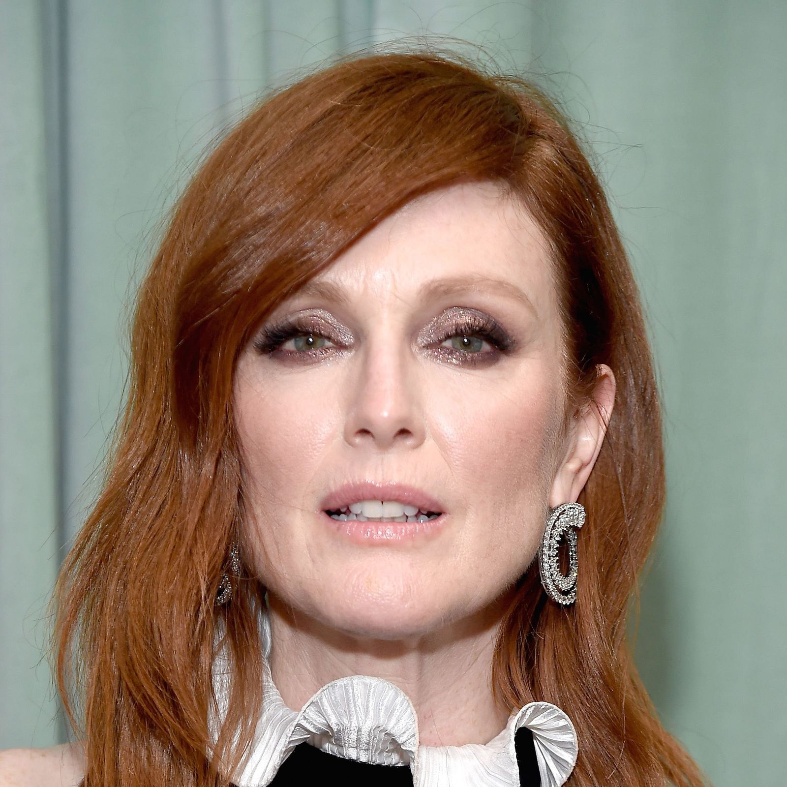 Vibrant Red Chin-Length Bob — Winter Hairstyles for Women Over 50