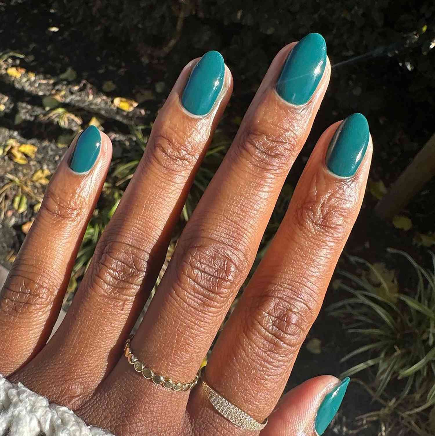 Glossy Deep Teal Oval Nails Glossy Deep Teal Oval Nails β Winter Nail Colors for Dark Skin