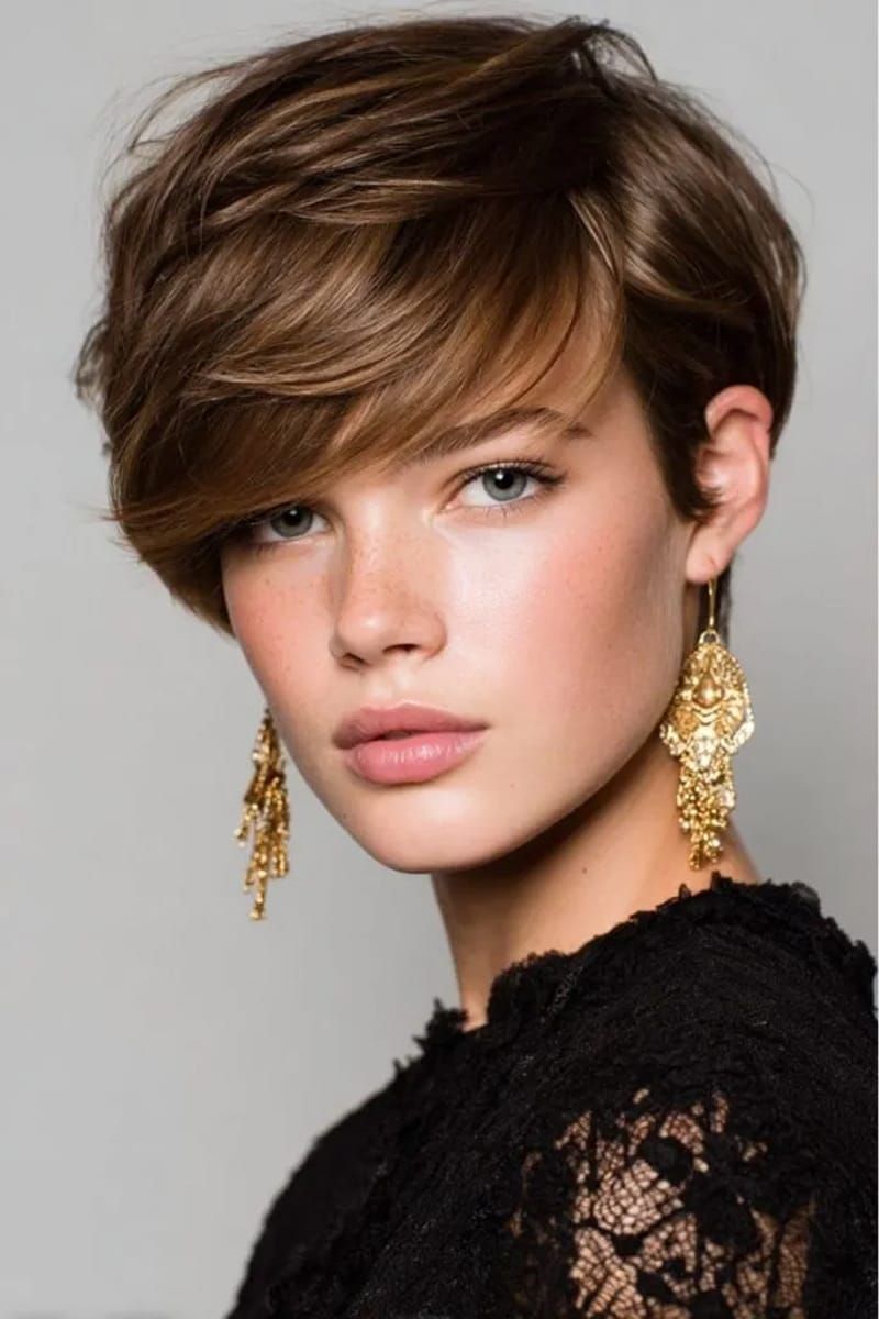 Side-Swept Bangs Textured Dark Brown Pixie With Long Bangs Side-Swept Bangs Textured Dark Brown Pixie With Long Bangs β Winter Pixie Haircuts