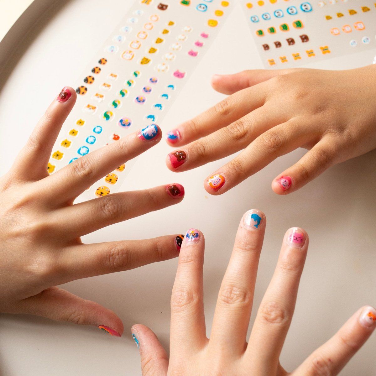 Various Cartoon Stickers On All Nails Visual Idea Various Cartoon Stickers On All Nails Visual Idea β Winter Nails for Teens