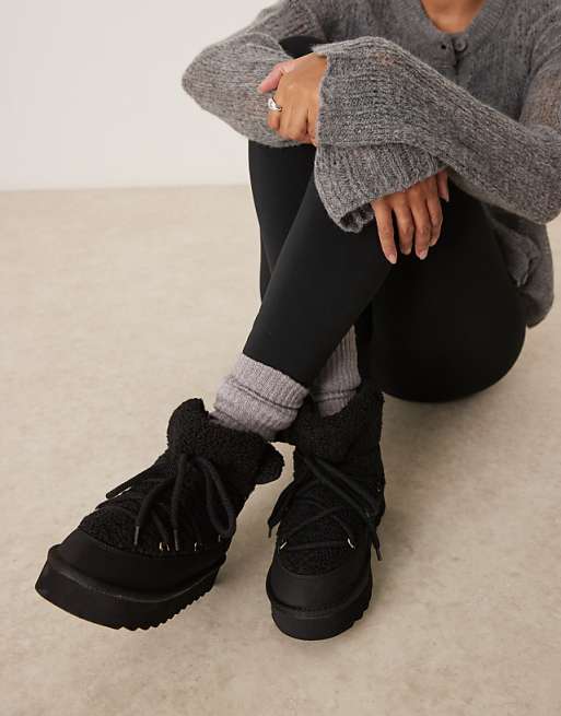 Shearling Trim Boots and Knitted Cardigan for Cozy Apres Ski Textures — Apres Ski Outfits