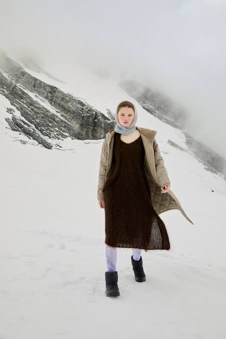 Quilted Coat Over Brown Knit Midi Dress in Snow — Europe Winter Outfits