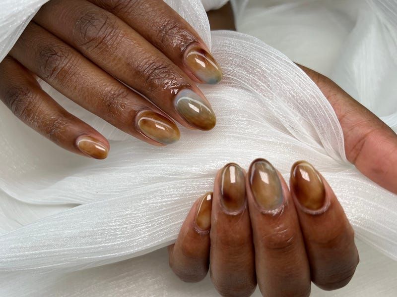 Abstract Swirl Brown and Blue Oval Nails Abstract Swirl Brown and Blue Oval Nails β Winter Nail Colors for Dark Skin
