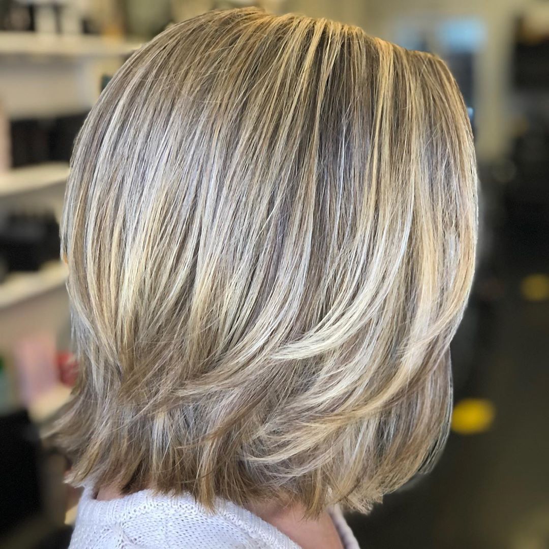 Blonde Layered Blowout Back View Blonde Layered Blowout Back View β Winter Shoulder Length Hairstyles