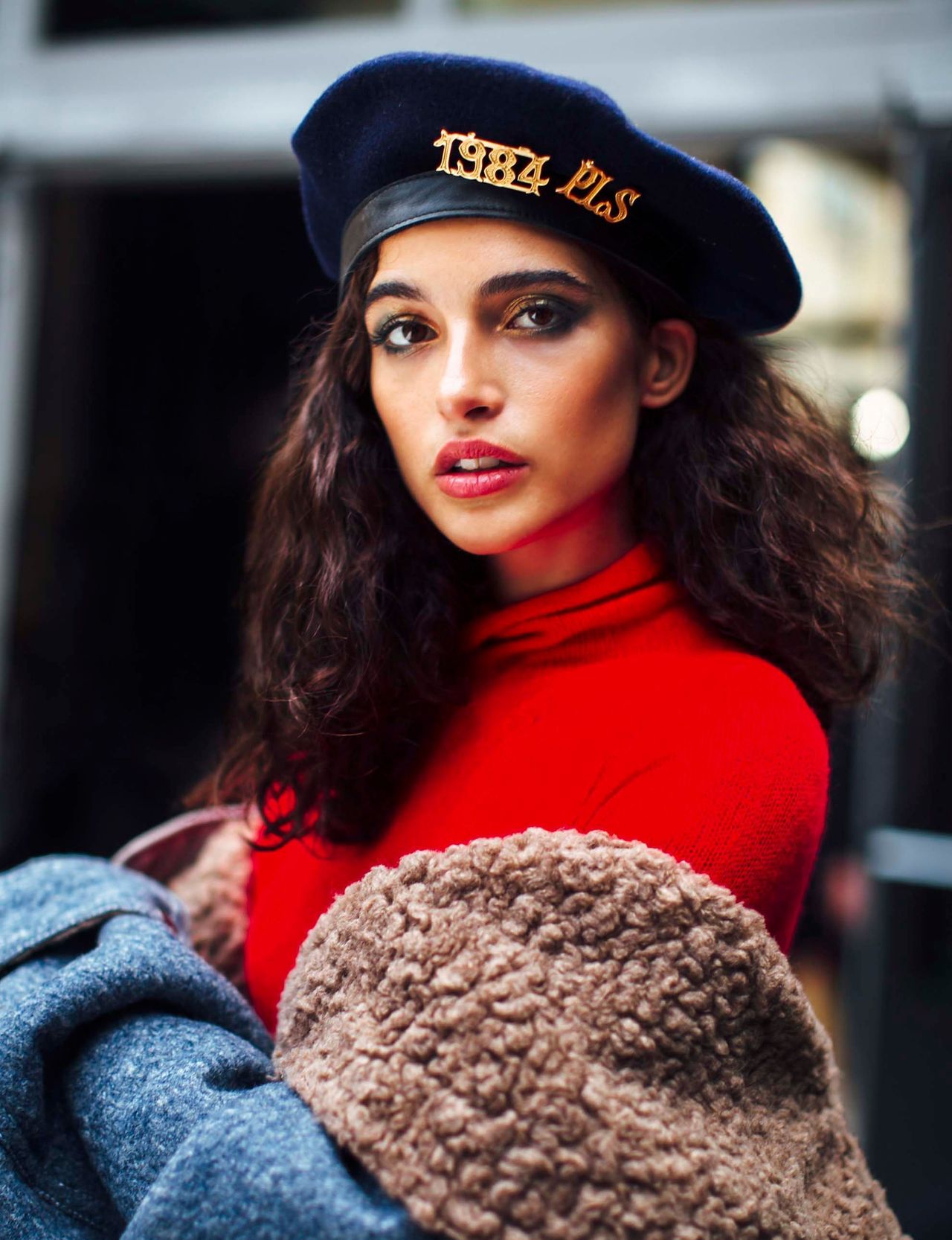Navy Beret with Gold Emblem Accents a Red Turtleneck Navy Beret with Gold Emblem Accents a Red Turtleneck β Beret Outfits