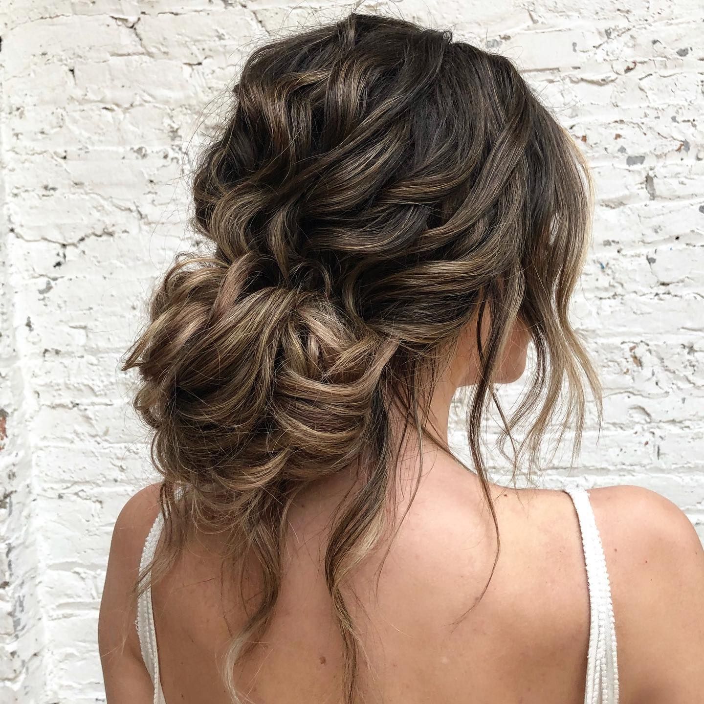 Dark Brown Textured Updo With Waves Dark Brown Textured Updo With Waves β Winter Wedding Guest Hairstyles