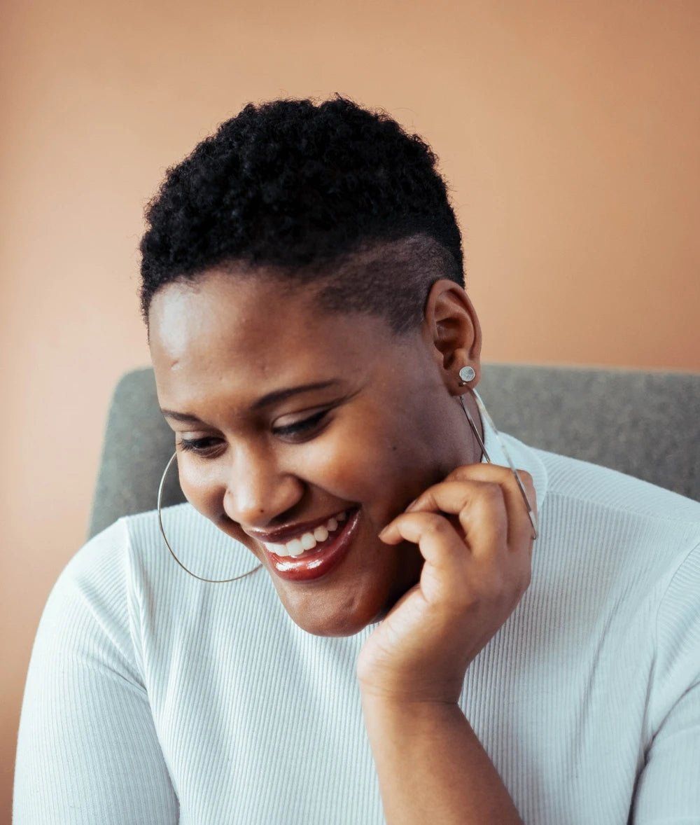 Textured Afro With Undercut Sides — Winter Haircuts for Black Women