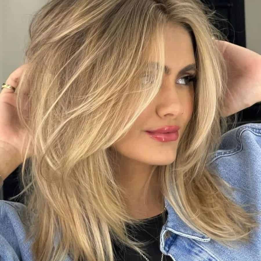 Ash Blonde Layered Lob With Swept Bangs Ash Blonde Layered Lob With Swept Bangs β Medium Length Winter Haircuts