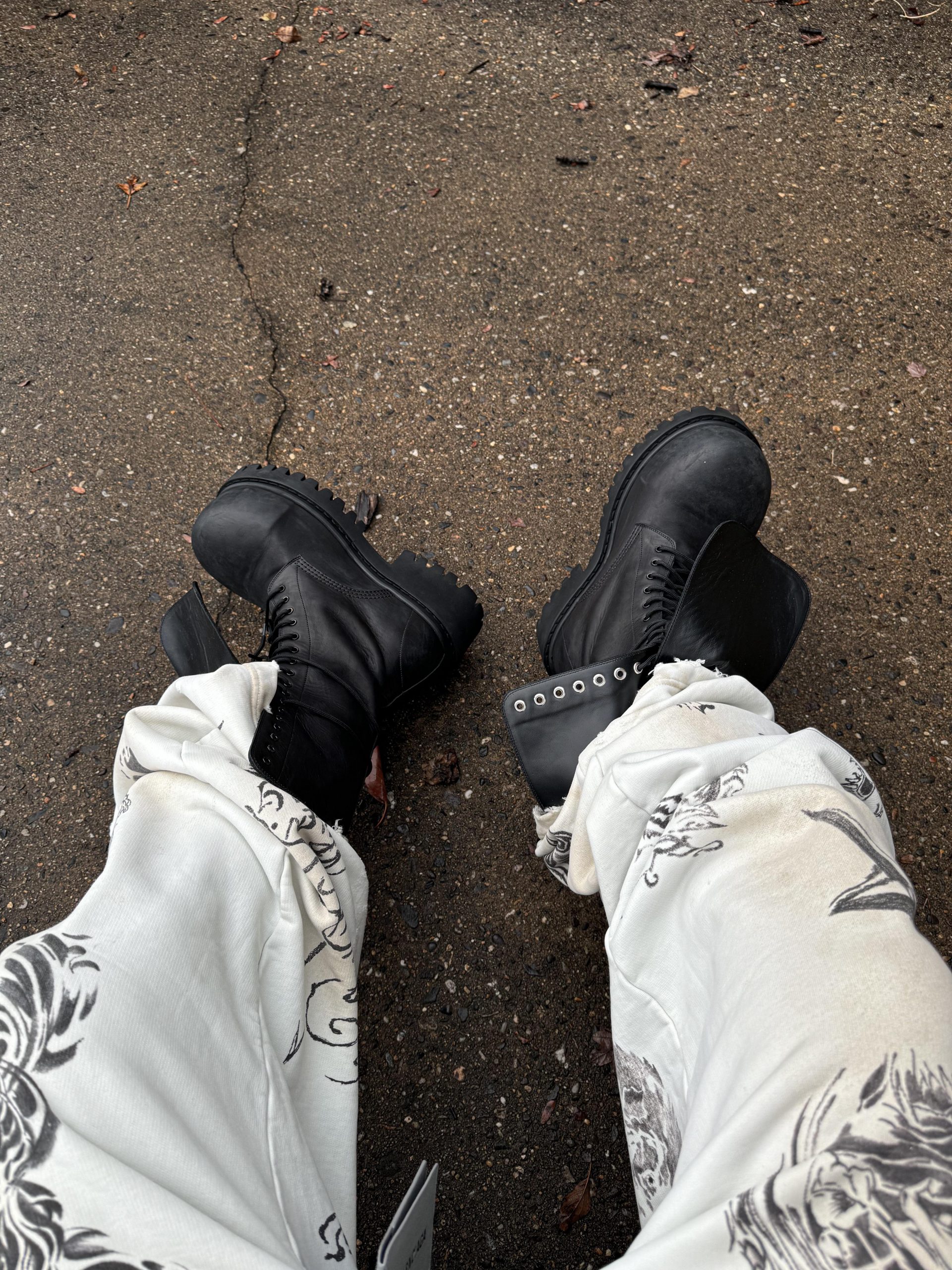Graphic Contrast: Black Combat Boots with White Graphic Print Pants Graphic Contrast: Black Combat Boots with White Graphic Print Pants β Combat Boots Outfits