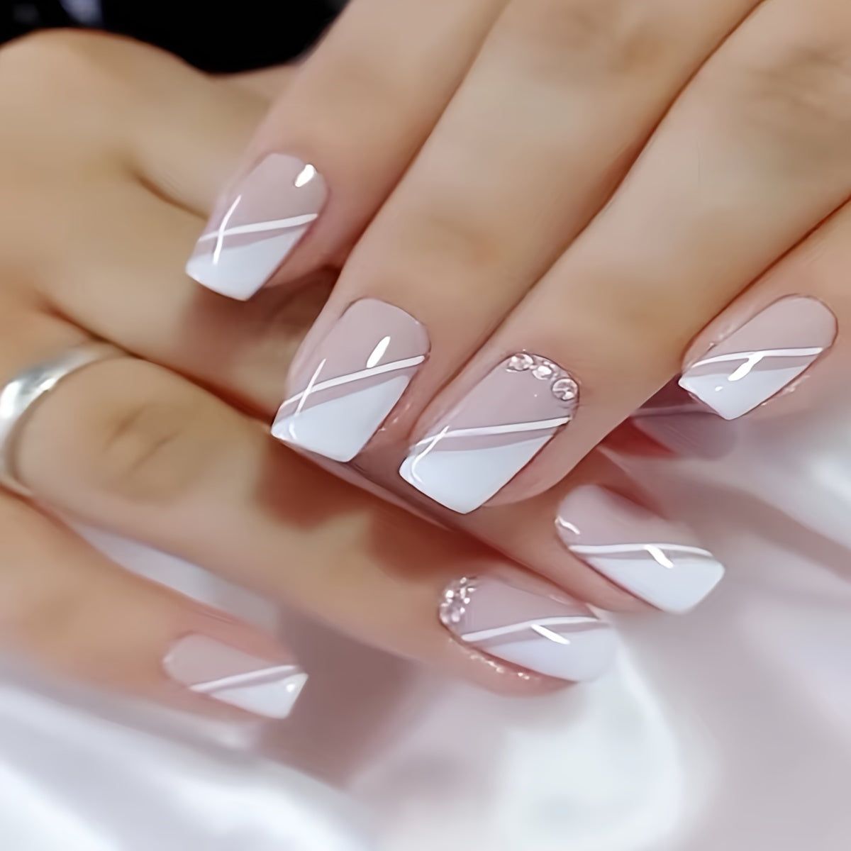 Sheer Pink Diagonal Lines With Rhinestones Sheer Pink Diagonal Lines With Rhinestones β Winter Rhinestone Nails