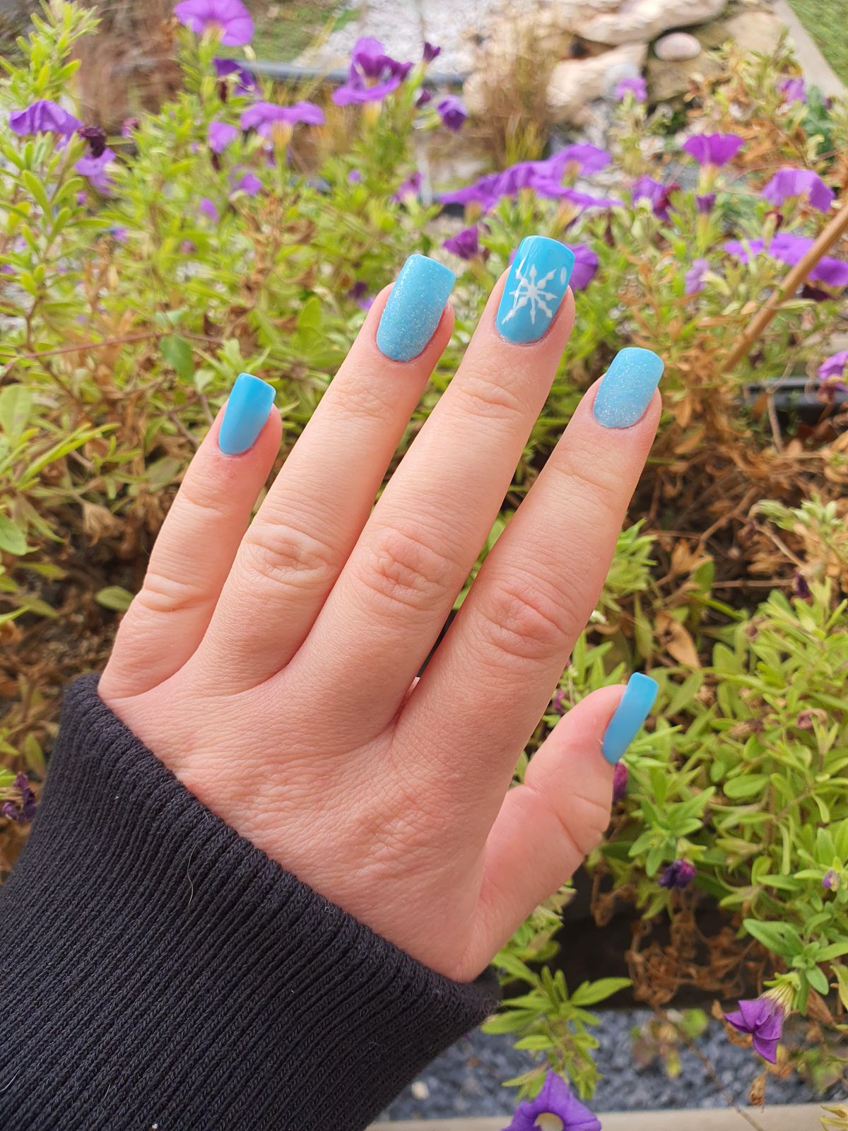 Light Blue Shimmery Snowflake Glitter Nails Light Blue Shimmery Snowflake Glitter Nails β Short Winter Acrylic Nails