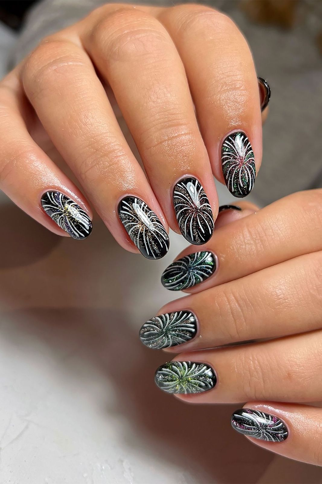 Glossy Black Glitter Fireworks Nails Glossy Black Glitter Fireworks Nails β Winter Nail Trends
