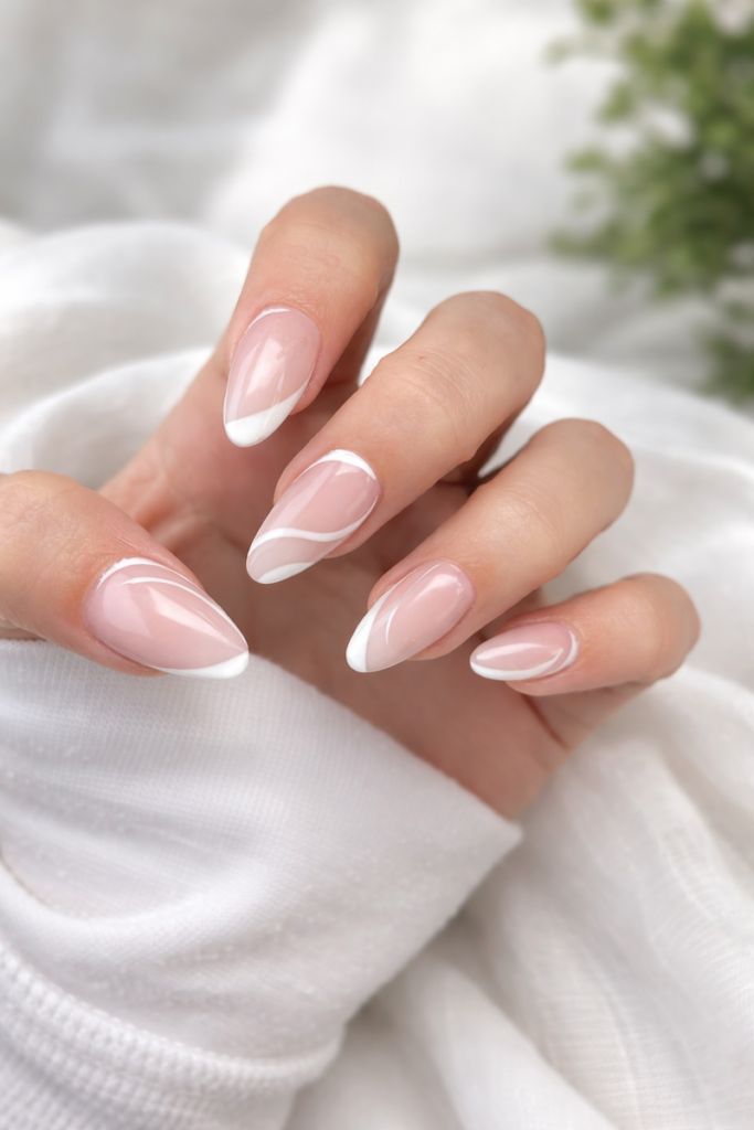 Nude French with White Abstract Swirls Nude French with White Abstract Swirls β Winter White Nails