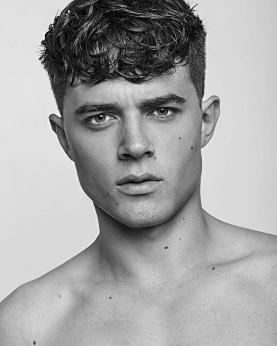 Textured Curly Crop with Tousled Top — Winter Haircuts for Men