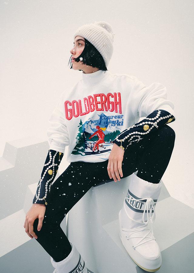 Graphic Ski Scene Sweatshirt and Moon Boots for Playful Apres Ski — Apres Ski Outfits