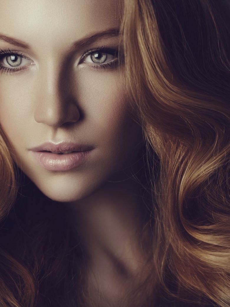 Warm Brown Voluminous Waves — Winter Haircuts for Long Faces