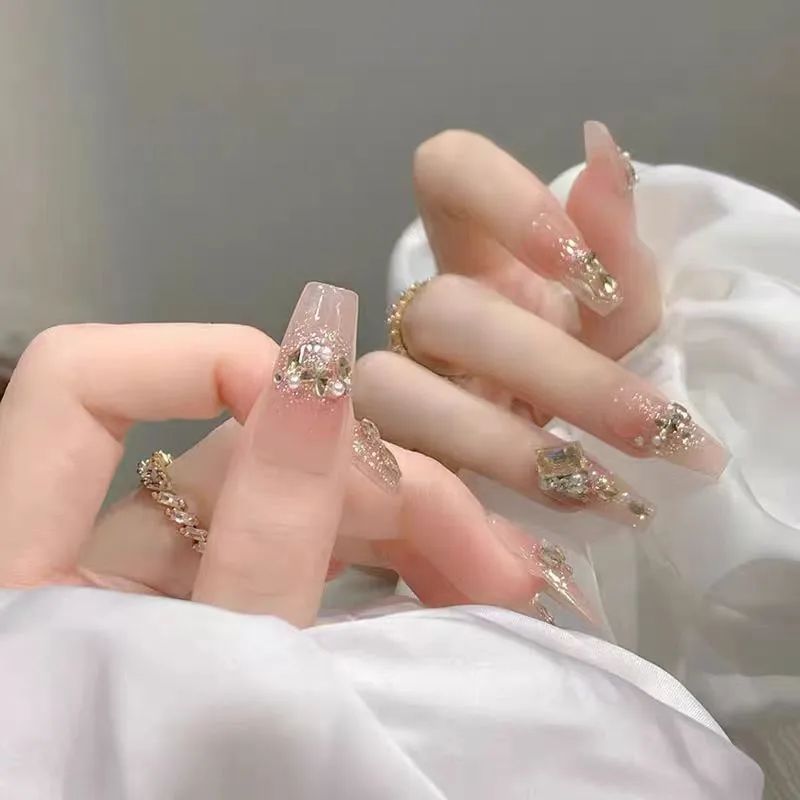 Rhinestones And Glitter On Accent Nails Visual Idea Rhinestones And Glitter On Accent Nails Visual Idea β Winter Champagne Nails