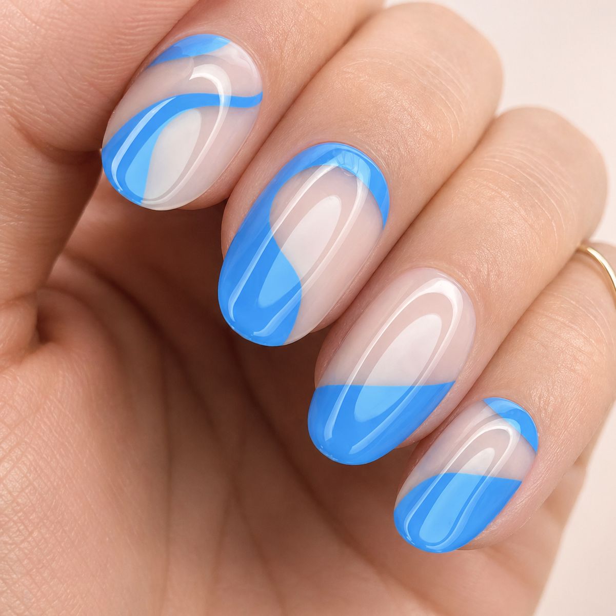 Clear Oval with Abstract Blue Waves Clear Oval with Abstract Blue Waves β Short Winter Round Nails