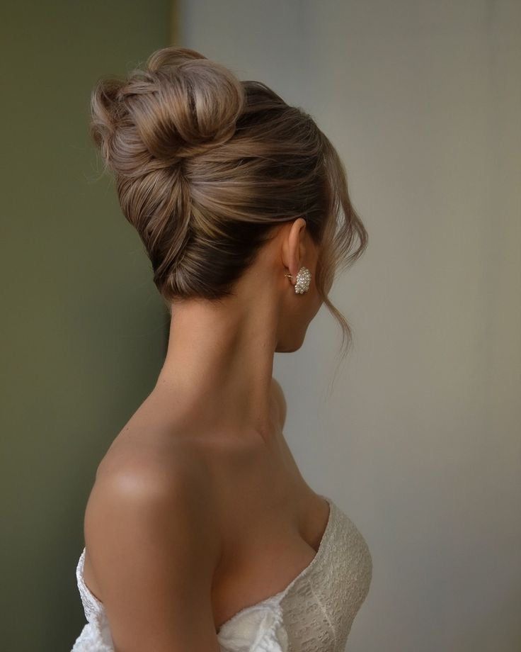 Sophisticated Ash Blonde Sculpted Chignon Sophisticated Ash Blonde Sculpted Chignon β Winter Wedding Guest Hairstyles