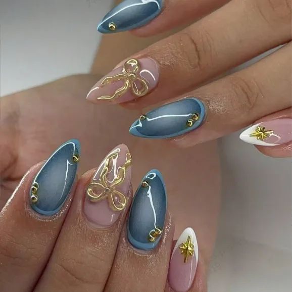 3D Gold Bows On Accent Nails Gold Studs Visual Idea 3D Gold Bows On Accent Nails Gold Studs Visual Idea β Winter Bow Nails