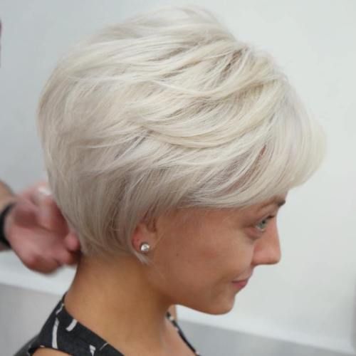 Layered Platinum Pixie with Side Bangs — Winter Haircuts for Women Over 40
