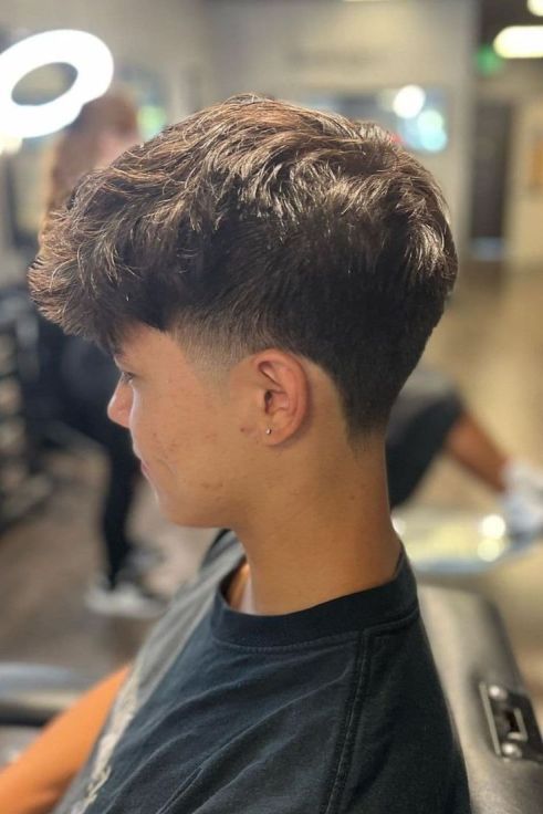 Taper Fade With Voluminous Top Taper Fade With Voluminous Top β Winter Haircuts for Boys