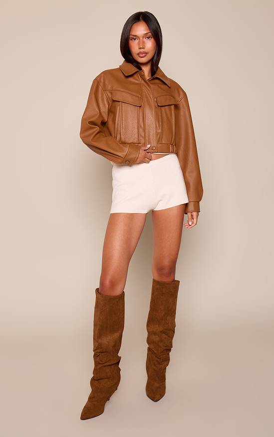 Cropped Jacket and High-Waisted Shorts with Brown Slouchy Boots Cropped Jacket and High-Waisted Shorts with Brown Slouchy Boots β Slouchy Boots Outfits