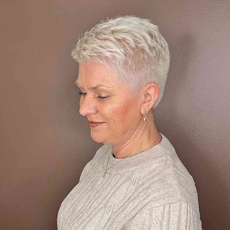 Layered Platinum Pixie With Silver Streaks Layered Platinum Pixie With Silver Streaks β Winter Haircuts for Women Over 70