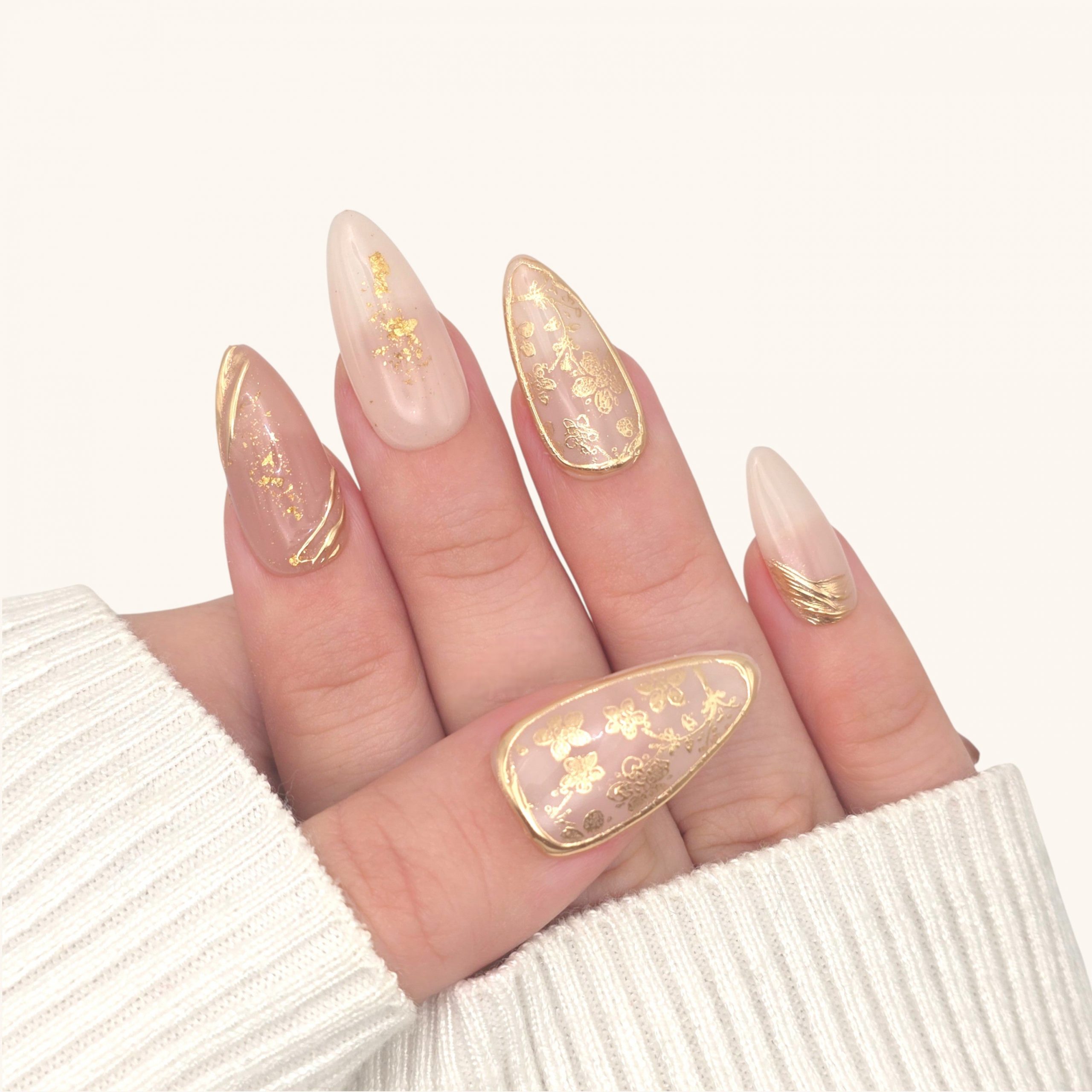 Milky Beige Nude Gold Foil Floral Almond Nails Milky Beige Nude Gold Foil Floral Almond Nails β Velvet Nails