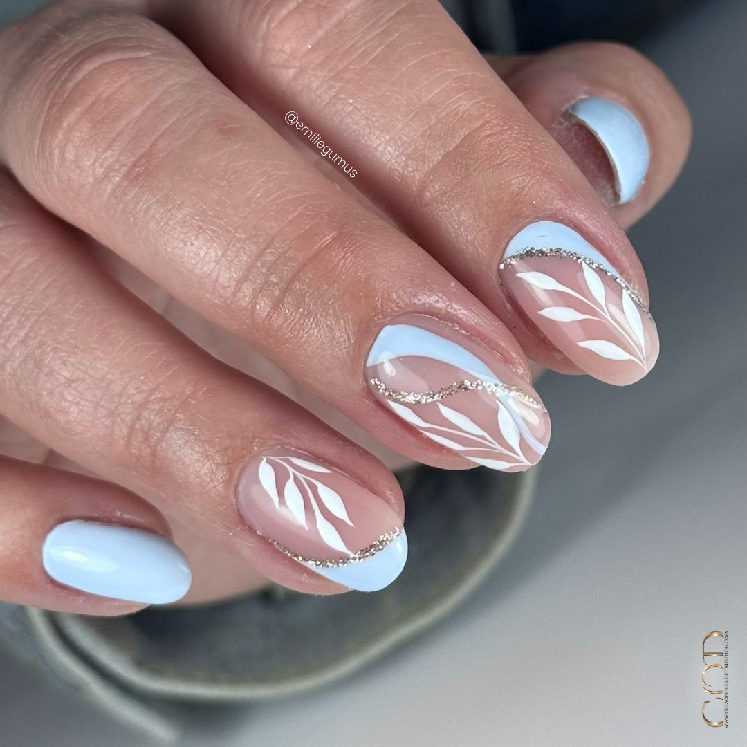 Light Blue with White Leaf Art and Silver Glitter Light Blue with White Leaf Art and Silver Glitter β Winter to Spring Transition Nails