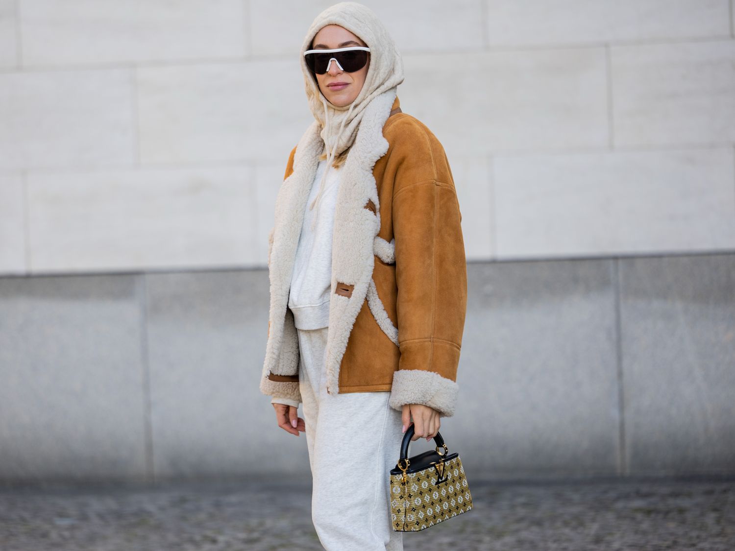 Shearling-Lined Suede Jacket and Hoodie for Relaxed Apres Ski — Apres Ski Outfits