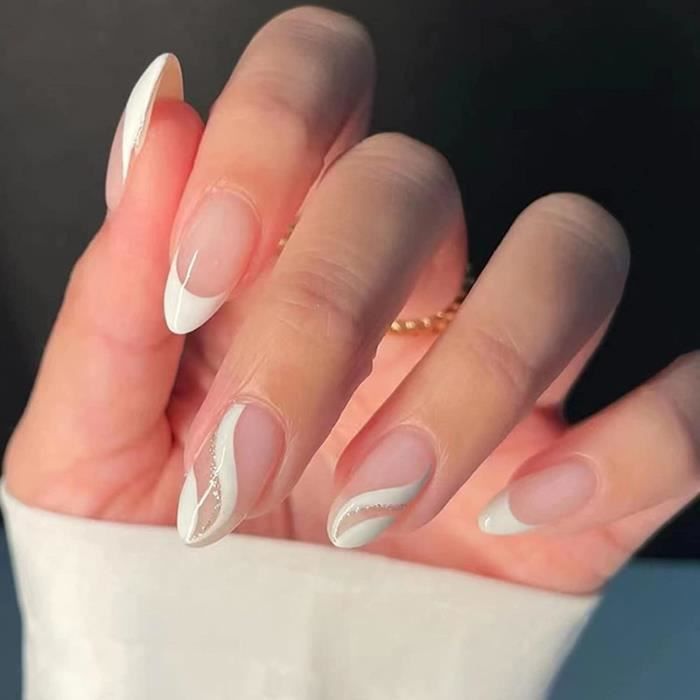 White Swirls and Silver Glitter White Swirls and Silver Glitter โ Short Winter Almond Nails