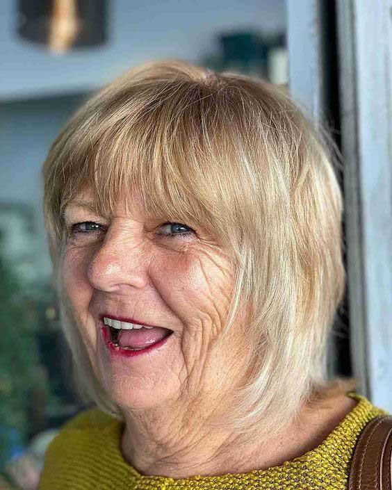 Textured Shag With Face-Framing Bangs Textured Shag With Face-Framing Bangs β Winter Haircuts for Women Over 70