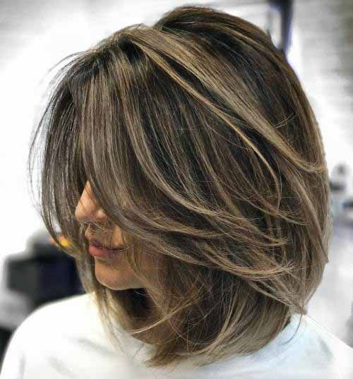 Chestnut Shag With Wispy Bangs Chestnut Shag With Wispy Bangs β Medium Length Winter Haircuts