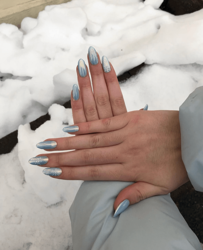 Chrome Shimmer Icy Blue Chrome Almond Nails with Snowflakes Chrome Shimmer Icy Blue Chrome Almond Nails with Snowflakes โ Winter Chrome Nails