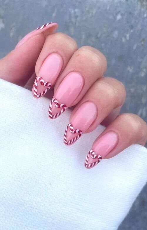 Candy Cane Heart French Tip Almonds — Christmas Nail Designs 2026