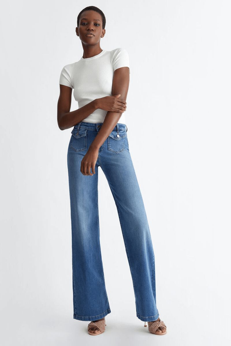 Denim Statement: Light Blue Flare Jeans with Ribbed Top — Flare Leggings Outfits