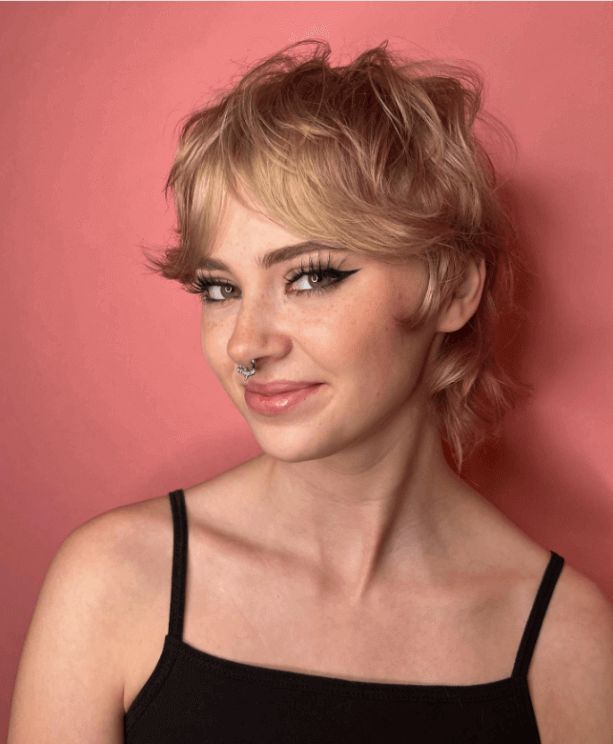 Chin Shag With Wispy Bangs — Winter Haircuts for Round Faces