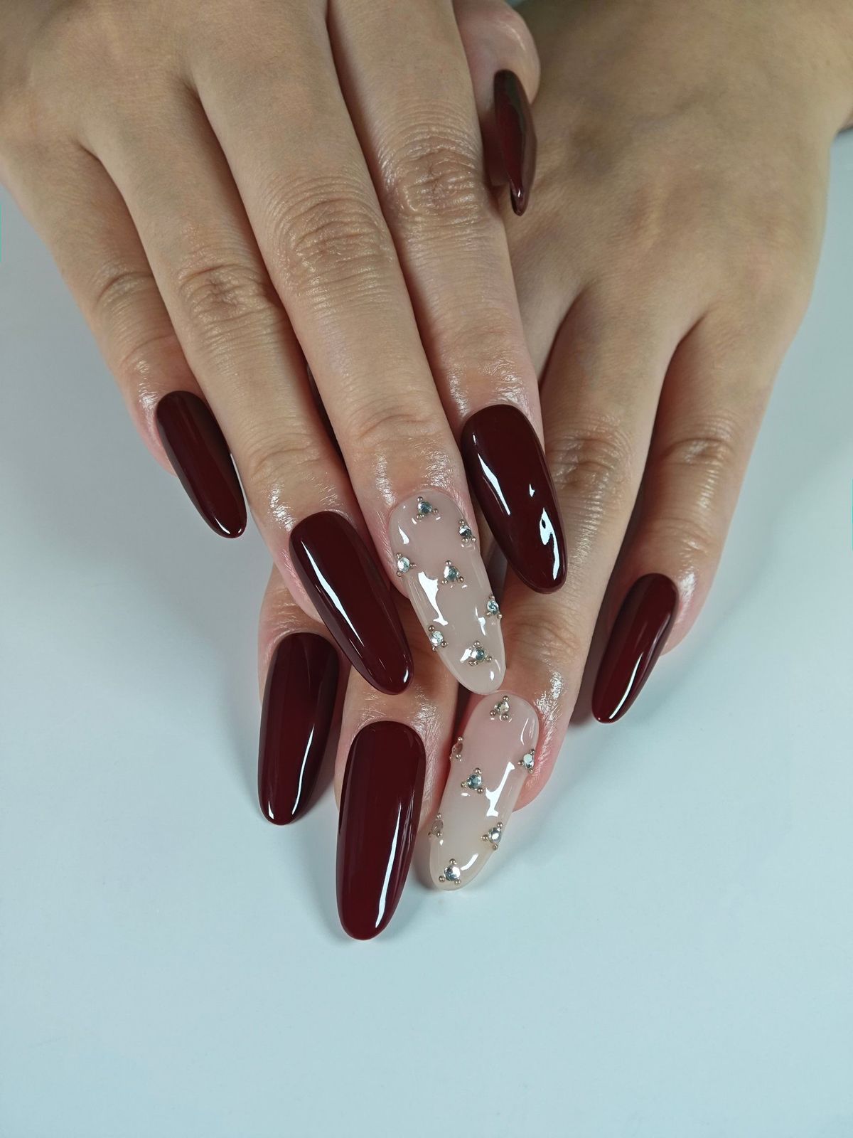 Rhinestone Accents On Nude Nails Visual Idea Rhinestone Accents On Nude Nails Visual Idea β Burgundy Christmas Nails 2026