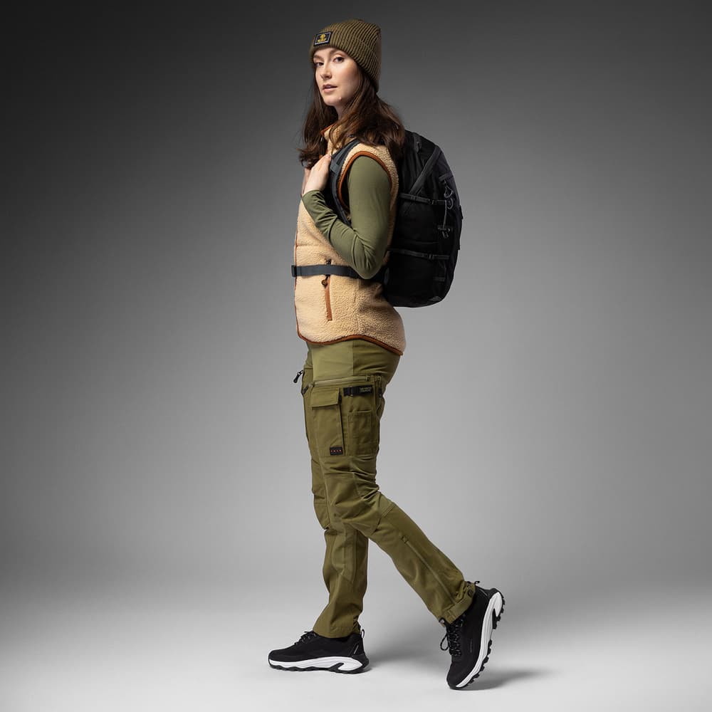 Tan Sherpa Vest Over Olive Shirt and Cargo Pants — Winter Hiking Outfits