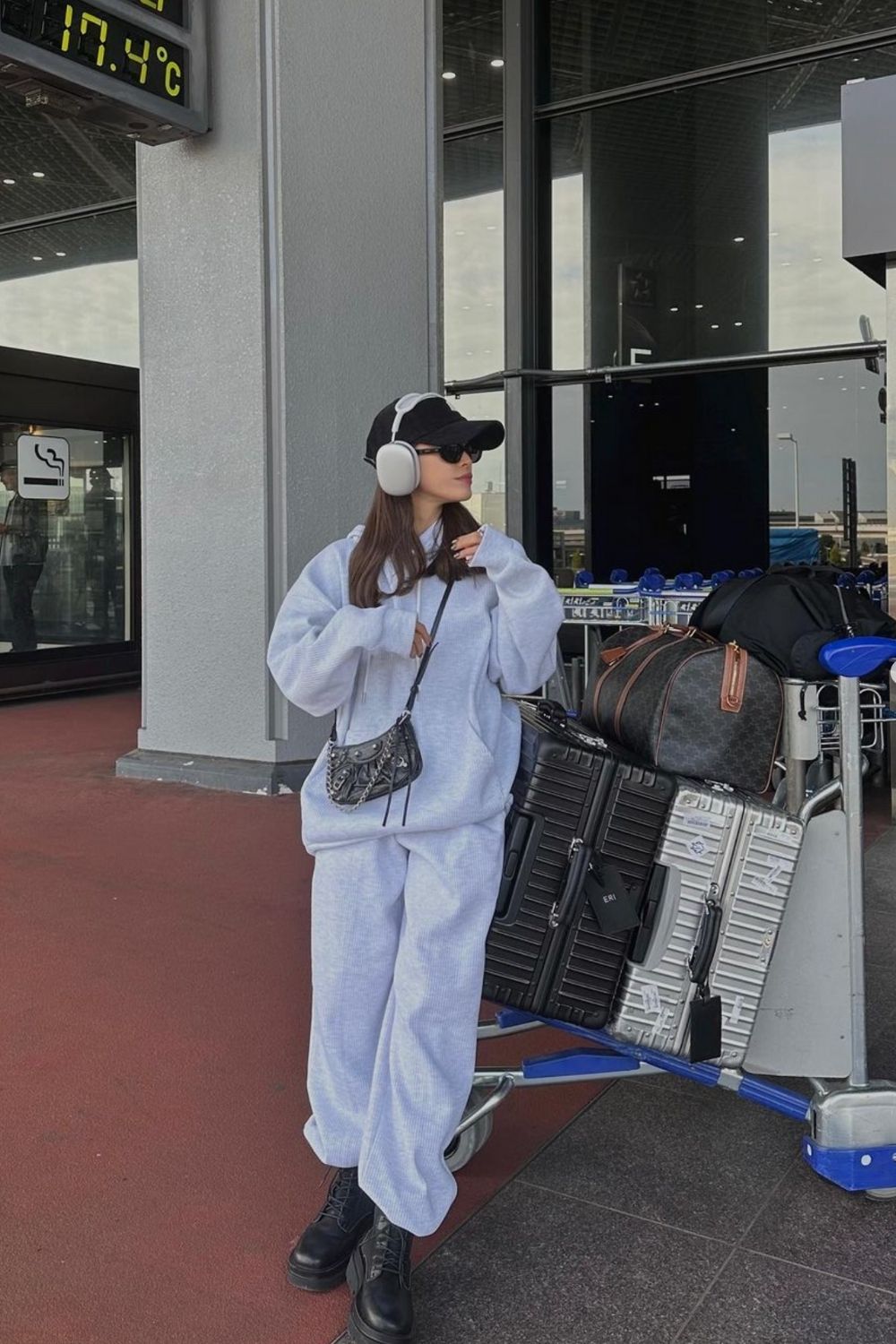 Oversized Athleisure: Waffle Knit Set with Combat Boots Oversized Athleisure: Waffle Knit Set with Combat Boots β Winter Airport Outfits