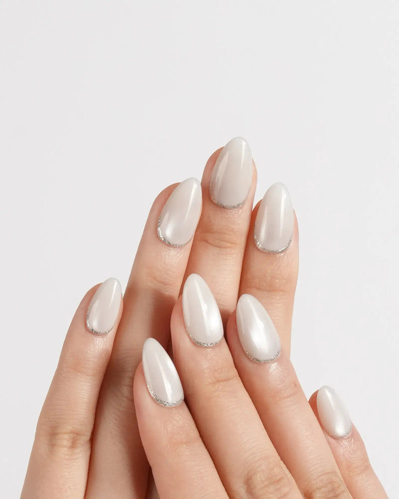 Pearlescent Off-White with Silver Line Pearlescent Off-White with Silver Line โ Short Winter Almond Nails