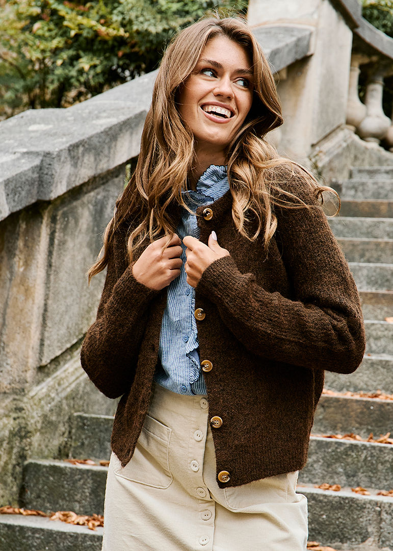 Knit Cardigan Over Striped Blouse with Corduroy Skirt — Winter Outfits for Warm Weather