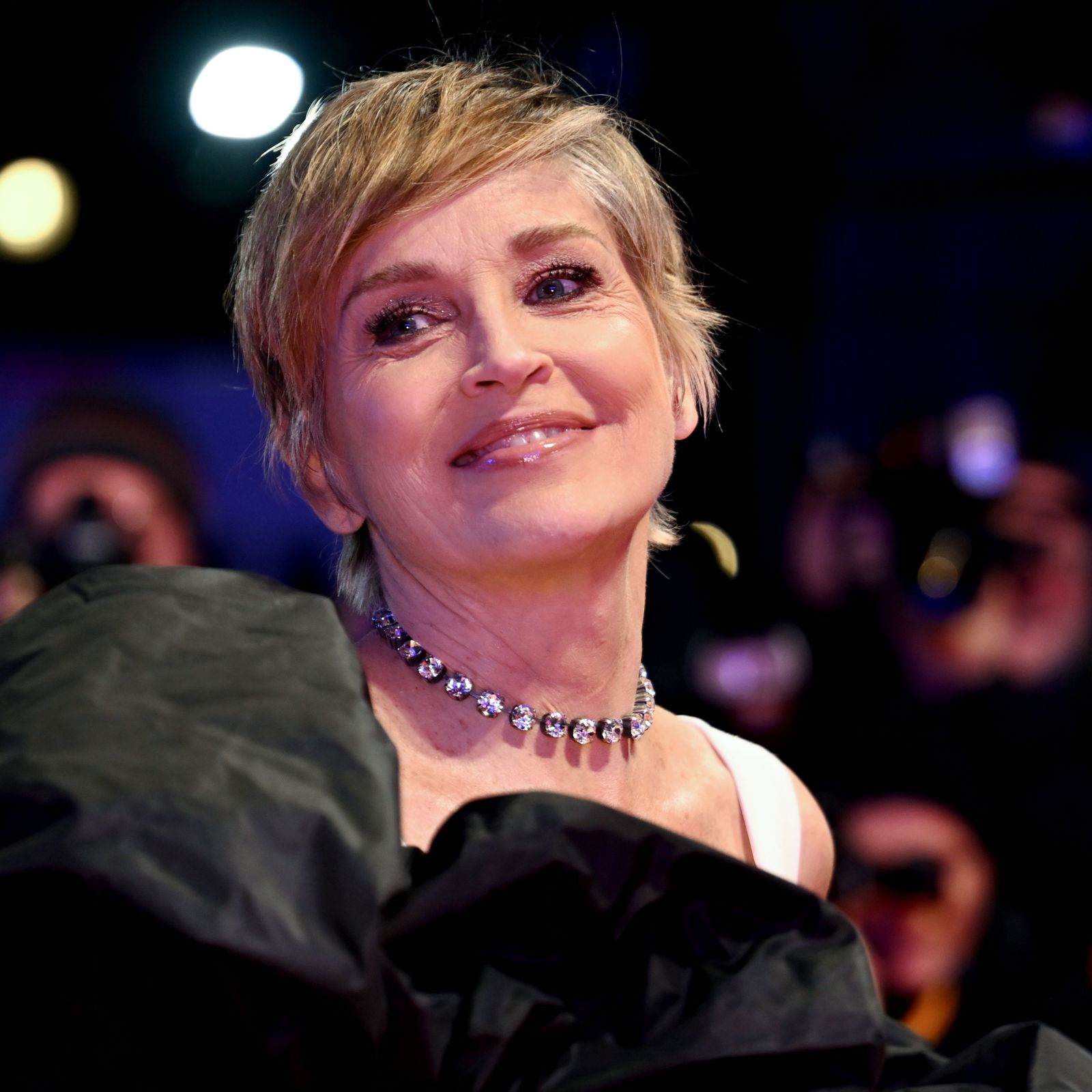 Ash Blonde Pixie With Side-Swept Fringe — Winter Haircuts for Women Over 60